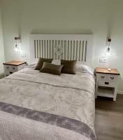 Postel nebo postele na pokoji v ubytování Casa Rural Namasté con SPA