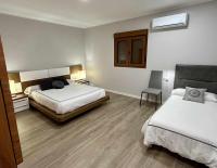 Postel nebo postele na pokoji v ubytování Casa Rural Namasté con SPA