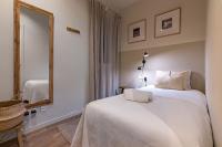 Posteľ alebo postele v izbe v ubytovaní Habitat Apartments Sweet Sagrada Familia