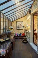 a living room with a table and a couch at Apartment in heart of Marais by Studio prestige in Paris