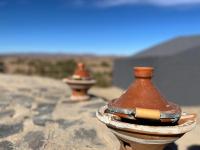 two fire hydrants sitting on top of a rock at Auberge camping café restaurant Relax Tazoulait in Bou Dib