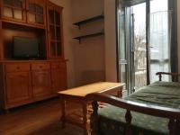 TV a/nebo společenská místnost v ubytování Apartamento con terraza Herbasabina 1