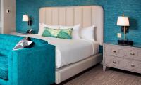Ein Bett oder Betten in einem Zimmer der Unterkunft Beau Rivage Resort &amp; Casino