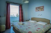 Posteľ alebo postele v izbe v ubytovaní Dimitropoulos Apartments