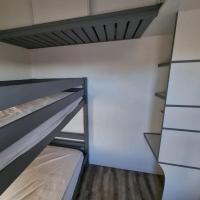Posteľ alebo postele v izbe v ubytovaní Bellyenmer Gruissan