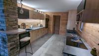 Kuchyňa alebo kuchynka v ubytovaní La Boutame : chalet au pied des pistes à Villard Reculas