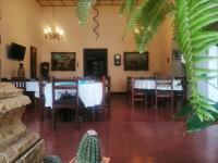 Un televizor și/sau centru de divertisment la Hotel Real