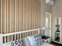 Posteľ alebo postele v izbe v ubytovaní MD Modern Hotel - Jardines