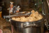 a large pot filled with balls of food at VOA Hotel Caxambu in Caxambu