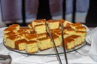 a cake sitting on top of a plate on a table at VOA Hotel Caxambu in Caxambu