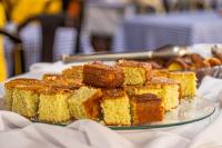 a plate of cakes on top of a table at VOA Hotel Caxambu in Caxambu