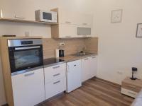 Kuchyňa alebo kuchynka v ubytovaní Rosé Apartment