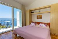 Posteľ alebo postele v izbe v ubytovaní Apartments Dream view