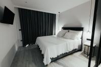 Posteľ alebo postele v izbe v ubytovaní Apartment Black Diamond