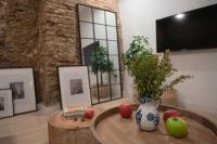 TV a/nebo společenská místnost v ubytování Suites Jardines de la Alhambra