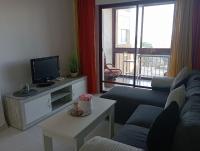 Televízia a/alebo spoločenská miestnosť v ubytovaní Apartment in La Mata with sea views