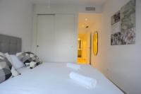 Postel nebo postele na pokoji v ubytování OASIS Malaga City Apartment