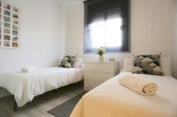 Postel nebo postele na pokoji v ubytování OASIS Malaga City Apartment