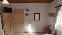 TV a/nebo společenská místnost v ubytování Angelos Rooms