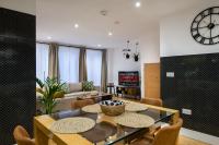 London Nino Apartmentsにあるテレビまたはエンターテインメントセンター