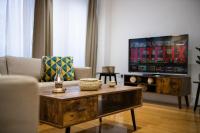 London Nino Apartmentsにあるテレビまたはエンターテインメントセンター