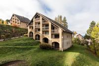 an unfinished house on a hill with a yard at Les Narcisses - aux pieds des pistes in Saint-Léger-les-Mélèzes