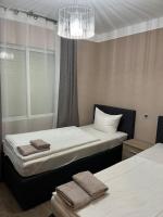 Posteľ alebo postele v izbe v ubytovaní Villa Nadiya App Pool, Parking