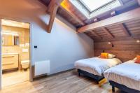 Posteľ alebo postele v izbe v ubytovaní CHALET EAGLE