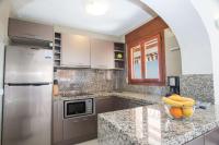 A kitchen or kitchenette at Villa Erik - PlusHolidays