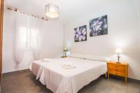 A bed or beds in a room at Villa Erik - PlusHolidays