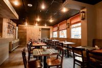 a dining room with tables and chairs in a restaurant at Smart Hotel Montevideo in Montevideo