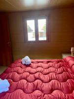 Uma cama ou camas num quarto em B&amp;B Snow Village Roccaraso