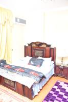 Postel nebo postele na pokoji v ubytování Kenzy guest house