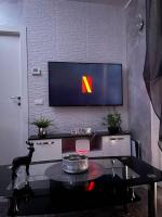Televízia a/alebo spoločenská miestnosť v ubytovaní Dave’s house