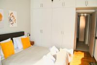 Posteľ alebo postele v izbe v ubytovaní GPK Lux 2BR - 7 min walking to Acropolis