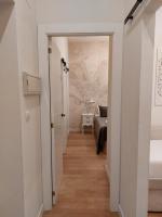 Posteľ alebo postele v izbe v ubytovaní Hidden Gem Pasquin Suites in Mercado Central