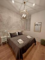 Posteľ alebo postele v izbe v ubytovaní Hidden Gem Pasquin Suites in Mercado Central