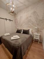 Posteľ alebo postele v izbe v ubytovaní Hidden Gem Pasquin Suites in Mercado Central
