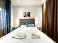 A bed or beds in a room at Dreamy Apartment City Center 11 thesbnbgr