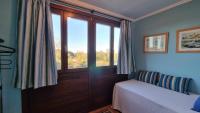 Postel nebo postele na pokoji v ubytování Casa Vacacional La Portillina