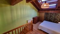 Postel nebo postele na pokoji v ubytování Casa Vacacional La Portillina