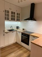 Kuchyňa alebo kuchynka v ubytovaní APARTAMENTY GUZIK