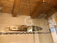a bathroom with a shower with a toilet in it at Maison Le Bernard, 5 pièces, 6 personnes - FR-1-357-253 in Le Bernard