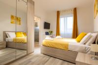 Posteľ alebo postele v izbe v ubytovaní Milano City Apartments - Stylish House Free WiFi-Parking-Airport