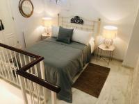 Posteľ alebo postele v izbe v ubytovaní Duplex La Almazara en el centro histórico de Córdoba