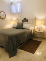 Posteľ alebo postele v izbe v ubytovaní Duplex La Almazara en el centro histórico de Córdoba