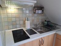 Kuchyňa alebo kuchynka v ubytovaní Apartment Erika