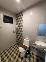 Koupelna v ubytování Aen Guy Boutique Hotel