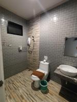 Koupelna v ubytování Aen Guy Boutique Hotel