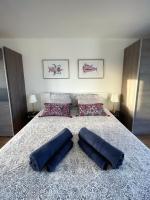Posteľ alebo postele v izbe v ubytovaní Azur Arts Lanzarote Lofts